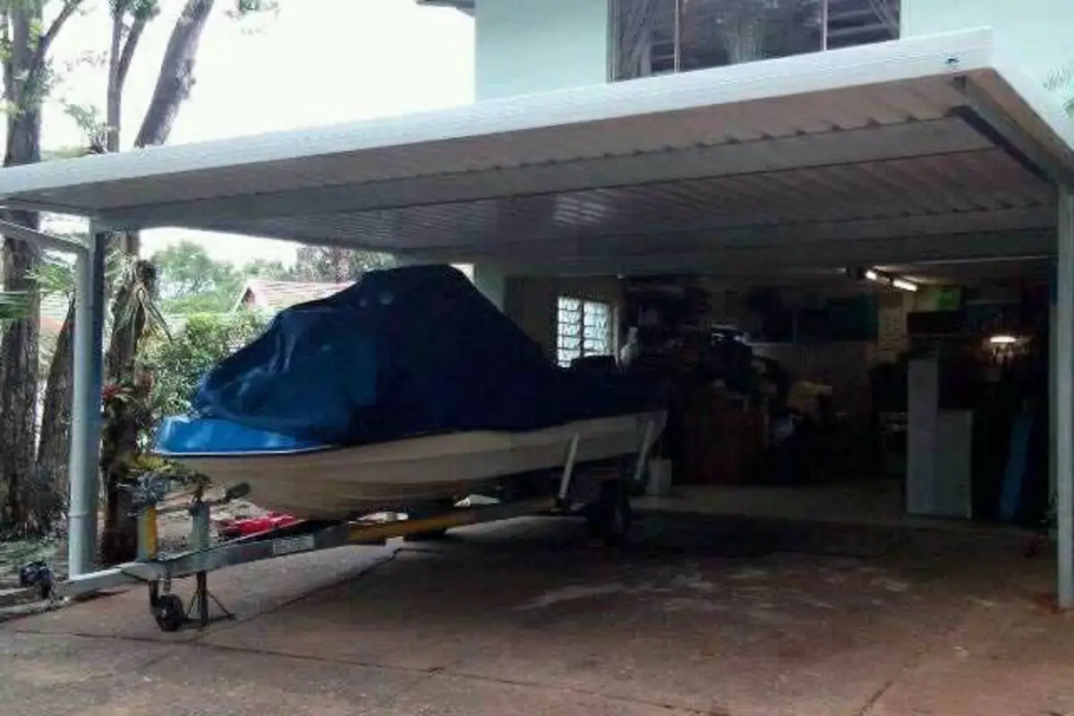 Cantilever steel carport installed over a home driveway