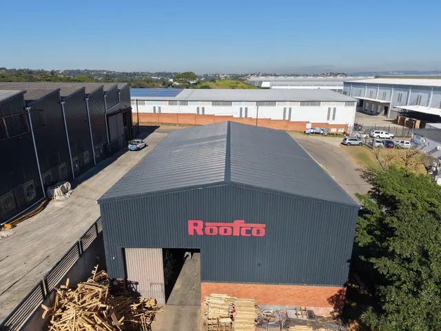 Roofco factory gable with the red Roofco sign, seen from above